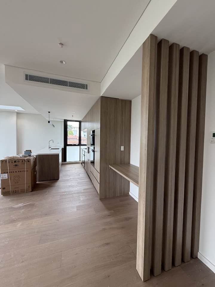 Custom timber screen and kitchen view